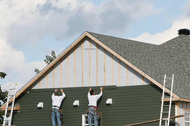 Professional Siding Repair technician working in Trinway, OH